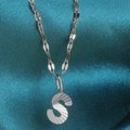 Silver stainless steel S-letter pendant necklace with radial texture on silk fabric - Letter S / Silver