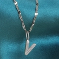 Silver stainless steel necklace with letter V pendant and radial texture detail - Letter V / Silver