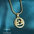 Gold Gemini zodiac pendant necklace with sparkling rhinestones and a sleek snake chain - Gemini