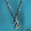 Zilveren roestvrijstalen ketting met letter Z-hanger en een klein hartjesdetail - Staal-Z