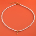 White pearl necklace with gold letter J heart pendant on orange background - Letter F (NK228ZP39270-2)