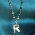 Silver alphabet letter R pendant necklace with sunburst texture on leaf chain - Letter R / Silver