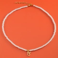 White pearl necklace with 18K gold plated letter O pendant and heart charm for women - Letter O (NK228ZP39270-2)