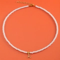 Elegant white pearl necklace with golden letter R pendant and small heart detail - Letter R (NK228ZP39270-2)