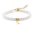 Pulsera de perlas con colgante de Capricornio dorado y cierre de mosquetón de acero inoxidable - Capricornio