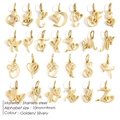 Diseño en matriz de 26 colgantes de corazón en acero inoxidable dorado de 10 mm x 9 mm - Dorado - Estilo Artístico