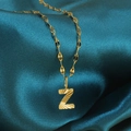 Gouden roestvrijstalen ketting met gestructureerde letter Z hanger op blauwe zijde - Goud-Z