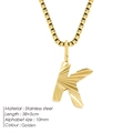 Golden stainless steel necklace featuring a letter K pendant with radial texture design - Letter K