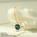 Detail of 14mm enamel blue wave pendant with golden accents on stainless steel chain - Wave Style (MFNK024G17)