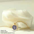 Close-up of golden moon star pendant with purple enamel on a fine stainless steel chain - Purple Moon Style (MFNK024G12)