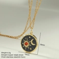 Detail of sun and moon pendant with red zircon inlay on stainless steel chain - Gold Celestial Sun Moon Round Pendant (MFNK032G10)