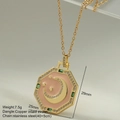 Detail of pink enamel moon and star octagon pendant with zircon stones and gold chain - Pink Octagonal Star Moon Zirconia Pendant (MFNK032G6)