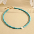 Blue turquoise beaded necklace with white shell letter D pendant and gold clasp - D (SHNK2435)