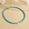 Handmade turquoise beaded necklace with gold lobster clasp and white shell letter I pendant - I (SHNK2435)