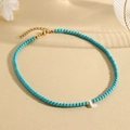 Turquoise bead necklace with shell letter L pendant and gold-plated adjustable chain - L (SHNK2435)