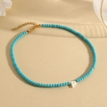 Turquoise beaded necklace with golden clasp and white shell letter P pendant charm - P (SHNK2435)
