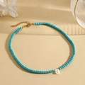 Turquoise bead necklace with white shell initial S pendant and gold adjustable chain - S (SHNK2435)