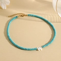 Blue turquoise beaded necklace with white letter W pendant and gold lobster clasp - W (SHNK2435)