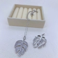 Macro detail of leaf pendant necklace showing micro-set zircons and honeycomb back - Silver Monstera Leaf Style / Silver Pendant Only (Without Chain)