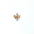 Detail of heart-shaped pendant with orange faceted gemstone and silver claw setting - Gold Yellow