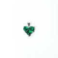 Macro view of heart-shaped green zircon pendant with silver four-prong setting - Green