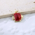 Macro detail of a fish-shaped charm with gold-plated copper and red enamel finish - Red 1
