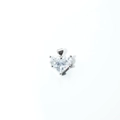 Detailed view of a silver heart-shaped pendant with a large clear heart-cut crystal - Clear