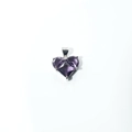 Close-up of a purple heart zircon pendant with silver-plated claw setting detail - Purple