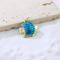 Macro shot of tropical fish pendant in gold and blue enamel for ocean necklaces - Blue 3