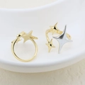 Adjustable gold and silver star-shaped rings on a ceramic tray for modern jewelry styling - Star Design Style (#1)