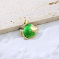 Detailed close-up of a gold-plated fish pendant featuring green enamel scales on stone - Dark Green