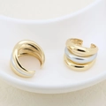 Close-up of minimalist two-tone triple band ring with polished gold and silver finishes - Three-layer Ridged Style (#5)