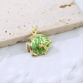 Detailed close-up of fish pendant with green enamel stripes on gold plated copper - Green Style 4