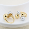 Detailed view of two-tone adjustable open ring featuring gold and silver spherical beads - Two-tone Metal Bead Style (#8)