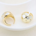Detail of gold-plated open rings with white enamel dots and cubic zirconia accents - Rhinestone Sphere Style (#10)