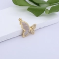 Close-up of gold-plated butterfly pendant with white shell inlay and zircon accents - Mother of Pearl Rhinestone Butterfly (MLDZ-3-12)