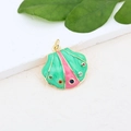 Macro detail of gold-plated shell pendant with green and pink enamel and rhinestones - Green Pink Scallop Pendant (#4)