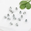 UFO disk earring backs with silver metal core and clear plastic pads for stability - Silver Tone