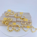 Detailed set of six gold-plated copper earrings featuring diverse geometric and twisted designs - Hollow Filigree Sphere Drop (#35)