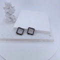 Black square Apple Watch case with pavé rhinestones on white stone texture background - Black Square Style