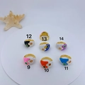 Colorful enamel swirl rings with zircon accents in black, blue, purple, and orange hues - Swirl Contrast Style 9 (9)