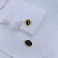 Detailed macro of shield pendant with black enamel star and micro-paved cubic zirconia - Enamel Black (#4)