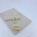 Close-up of mint green enamel twisted oval clasps with micro-pave crystals on stone - Mint Green