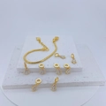 Detailed view of DIY Christmas tree enamel charms on a gold snake chain bracelet - White Christmas Tree Style (#7)