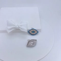 Detail of evil eye pendant showing intricate micro-set cubic zirconia and metal hollow back - Evil Eye Pupil Pattern (#4)