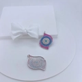 Detalle de colgantes de ojo de demonio con circonitas y reverso de nido de abeja - Mal de Ojo de Gota de Agua (#6)