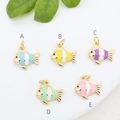 Macro detail of fish-shaped enamel pendants in five colors with 18K gold plating - Clownfish Shape (#1) / Purple Striped Fish Style (A)