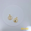 Macro shot of gold Nossa Senhora Aparecida pendants with sparkling cubic zirconia inlay - Religious Virgin Mary Style (#6)
