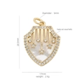 Macro detail of shield-shaped 18K gold pendant with mother of pearl and zircon inlay - Shield Shape Star Moon Shell Pendant (#15)