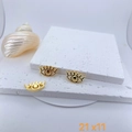 Detailed view of three 21x11mm gold evil eye pendants with cubic zirconia on stone tray - Gold Evil Eye Shape Style